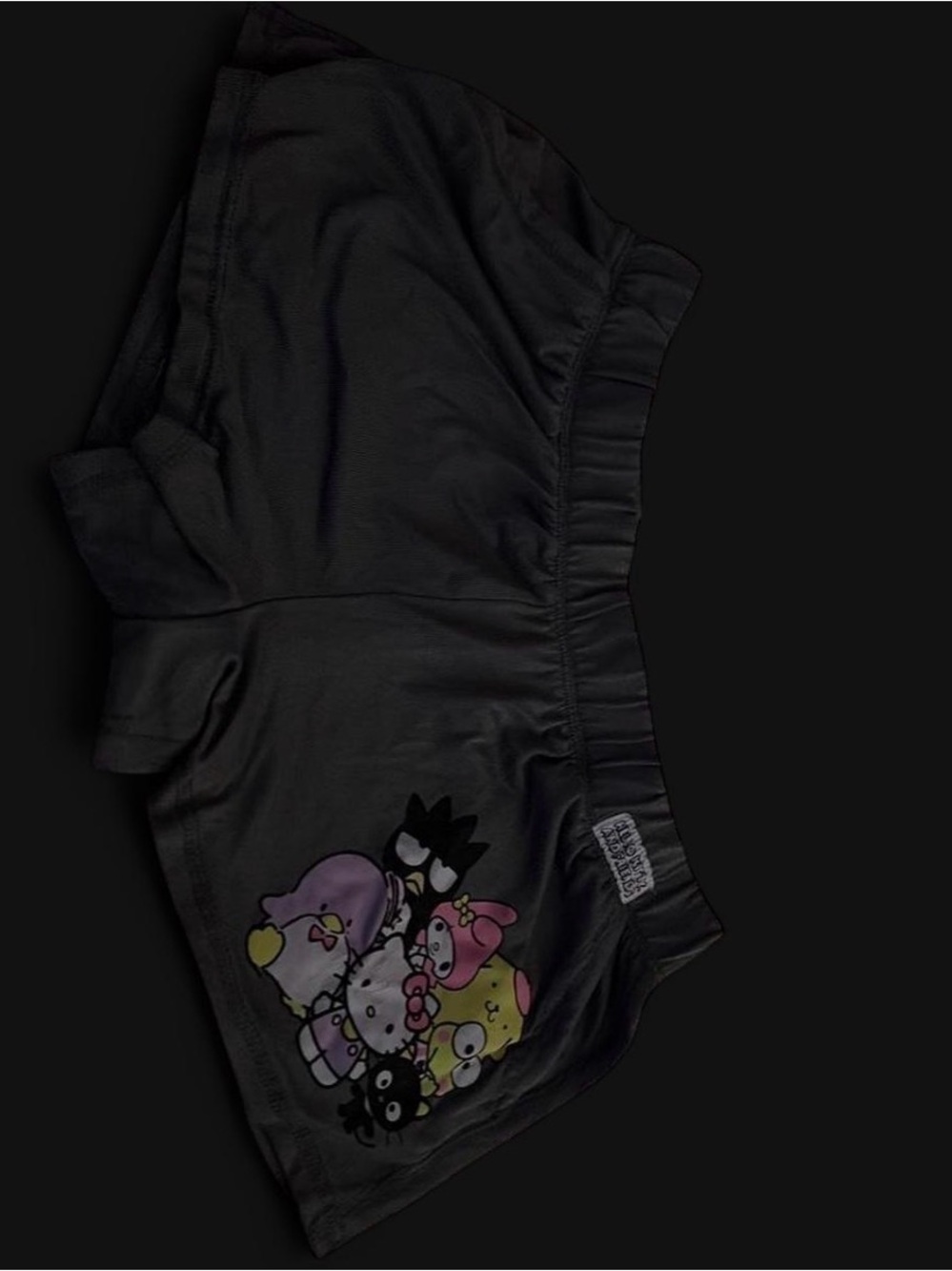 Sanrio Black Shorts with Colorful Character Cluster